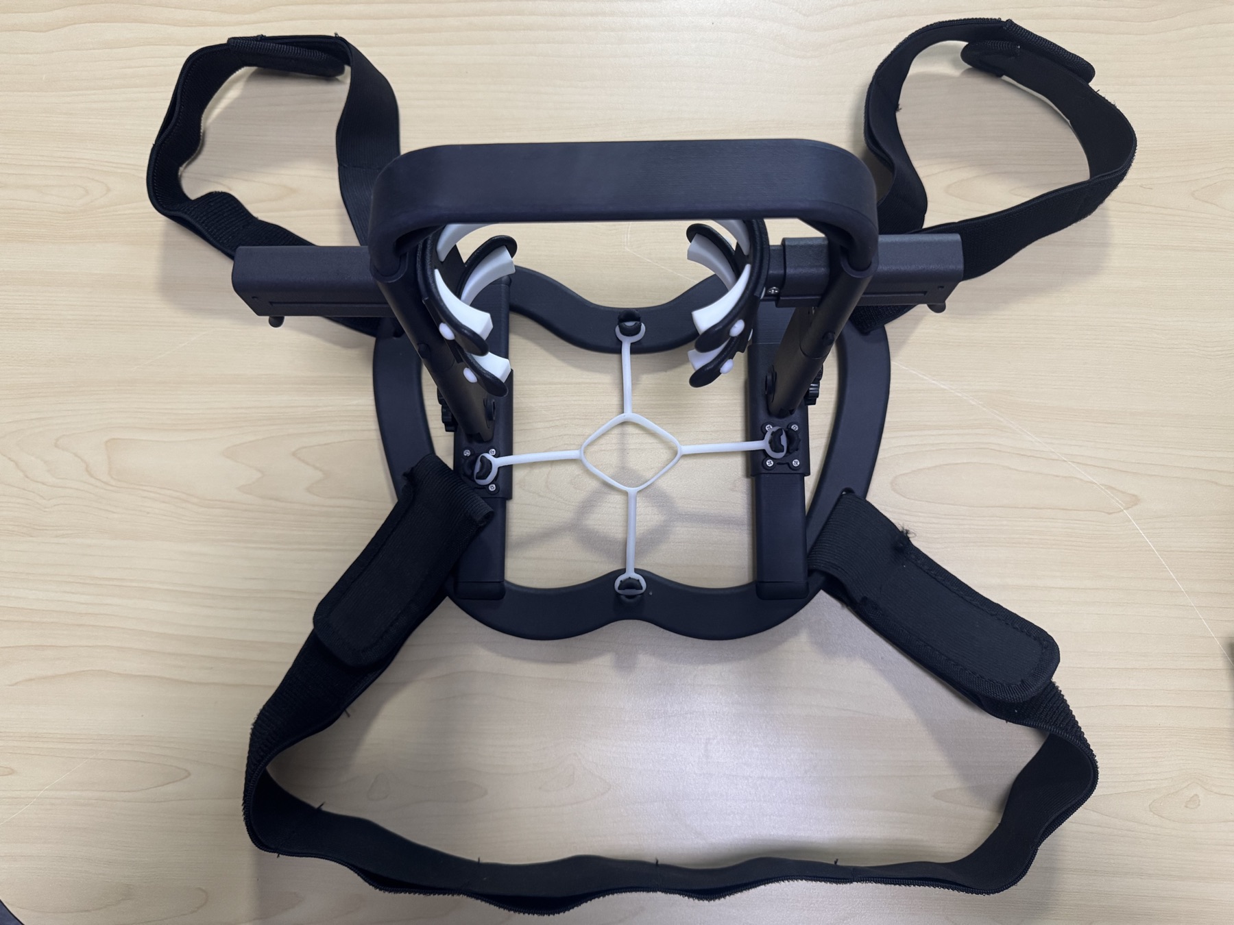 Modular multi-purpose VR mount prototype with adjustable frame and retention straps